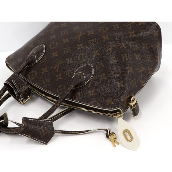 Louis Vuitton Lockit Shiny Monogram Handbag - Picture 3 of 7